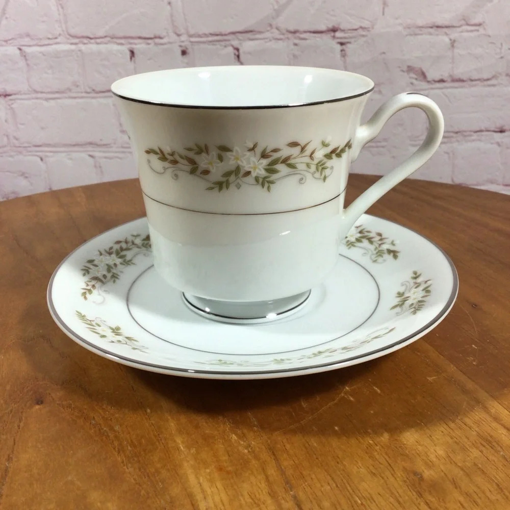 International Silver Company 326 Springtime Footed Cup and Saucer Set